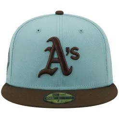New Era Men's Light Blue/Brown Oakland Athletics 1973 World Series Beach Kiss 59FIFTY Fitted Hat -Minnesota Twins Shop DSCO1155956663 1191 ALT2